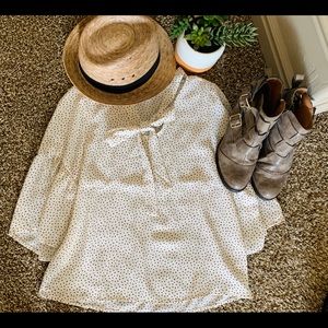 Blouse and full bow sleeve